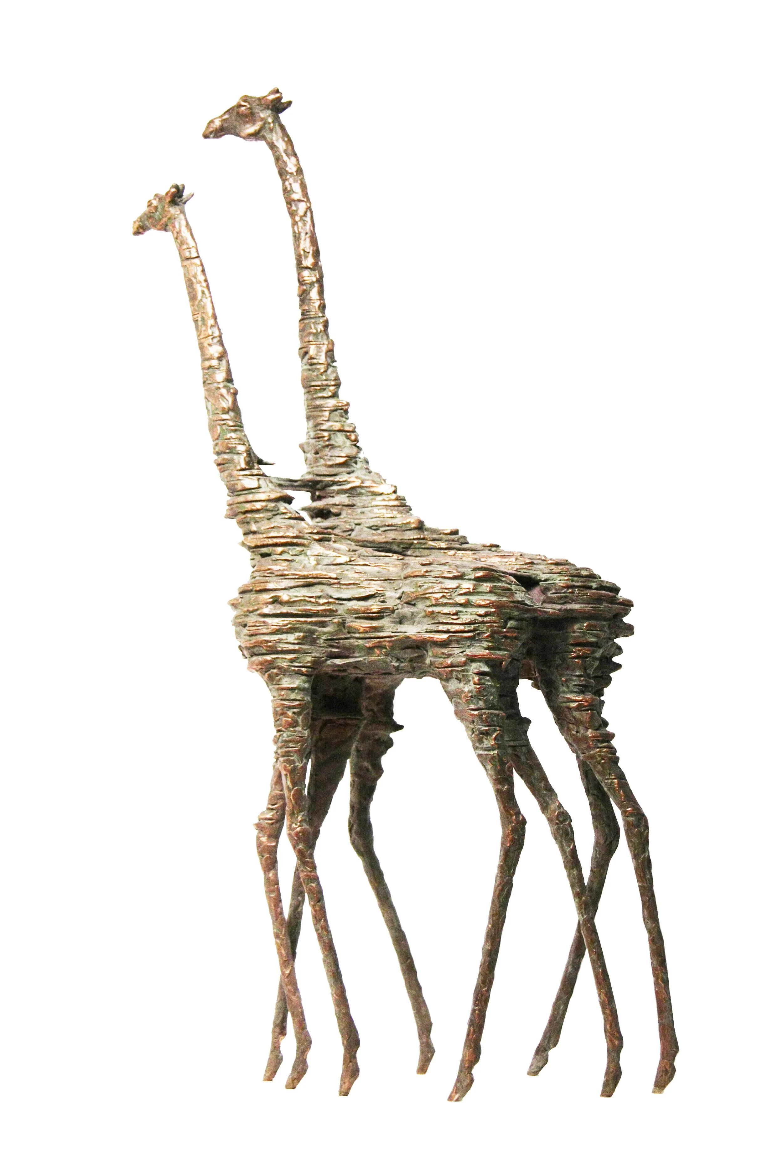 A bronze sculpture of two giraffes with elongated necks and legs, facing each other, displayed against a white background.