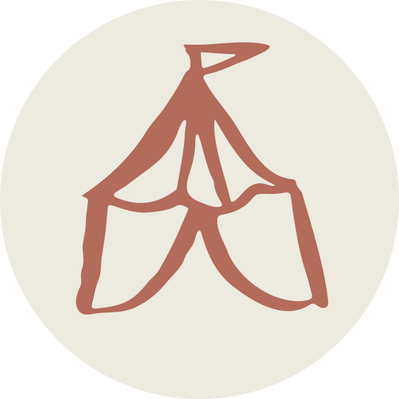 Simple line drawing of a folded paper object that resembles a butterfly or an abstract shape.