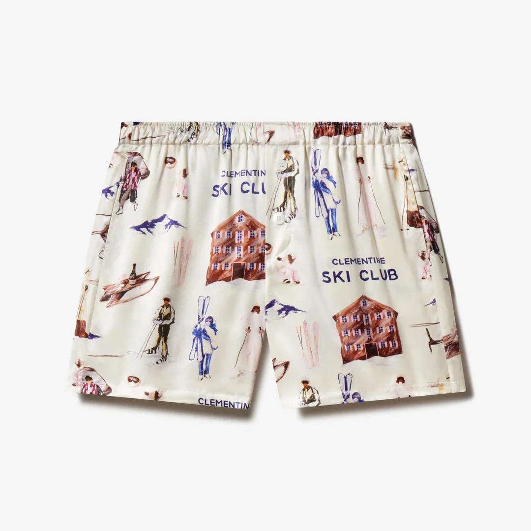 Boxers with a pattern featuring skiers, ski clubs, and mountain cabins.