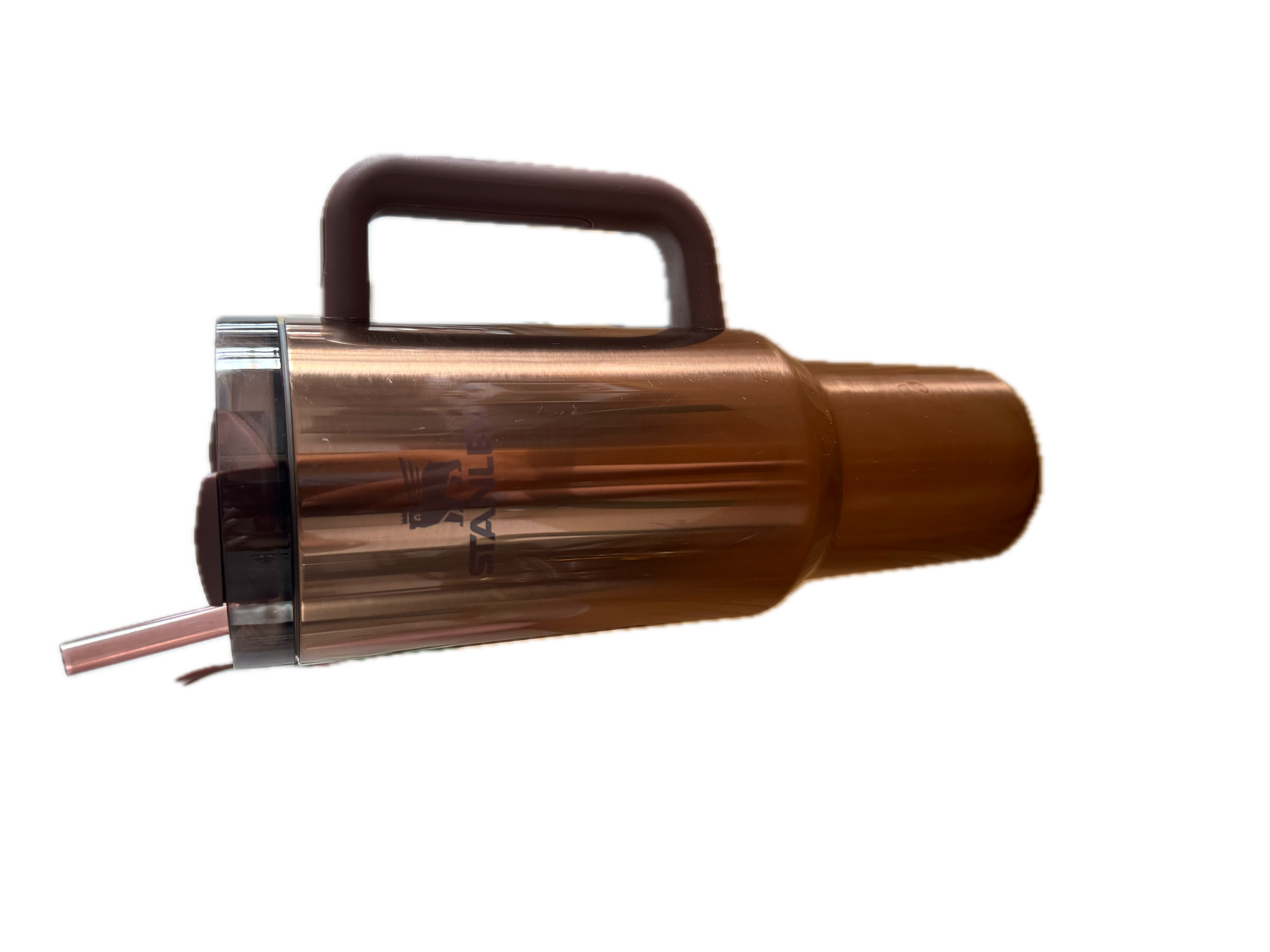 A copper-colored, electric kettle with a black handle, lid, and spout.