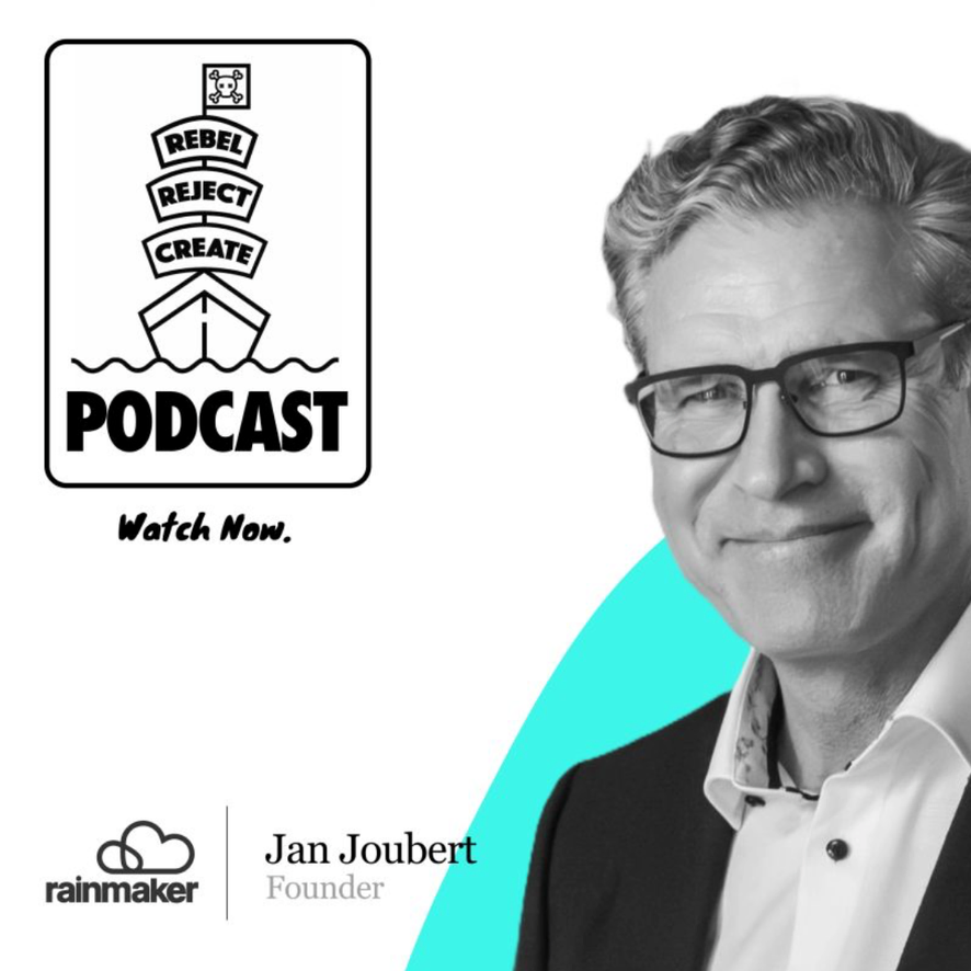 A promotional graphic for a podcast featuring Jan Joubert, founder of Rainmaker. The graphic includes a photo of Jan Joubert smiling, wearing glasses and a suit, with a light blue geometric background. The podcast logo displays a ship with the words 