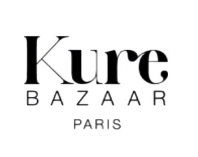 Logo du Kure Bazaar, marque de maquillage, avec 'Kure' en grand, 'Bazaar' en dessous et 'Paris' en dessous.