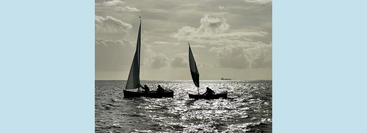 Recreational sailing on a summer evening