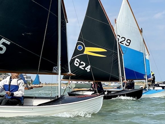 Scows heading for the start line