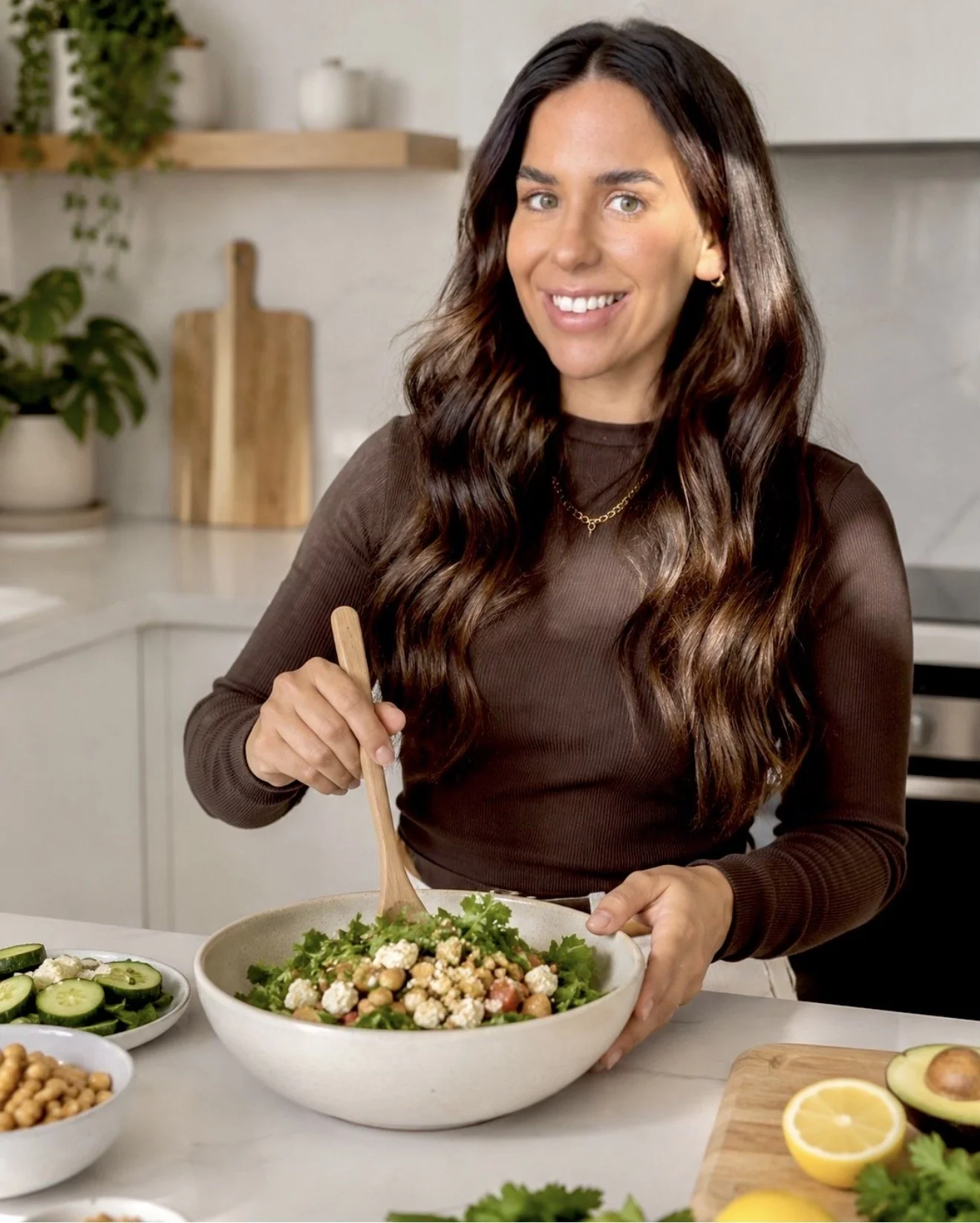 girl making salad in kitchen for period problems