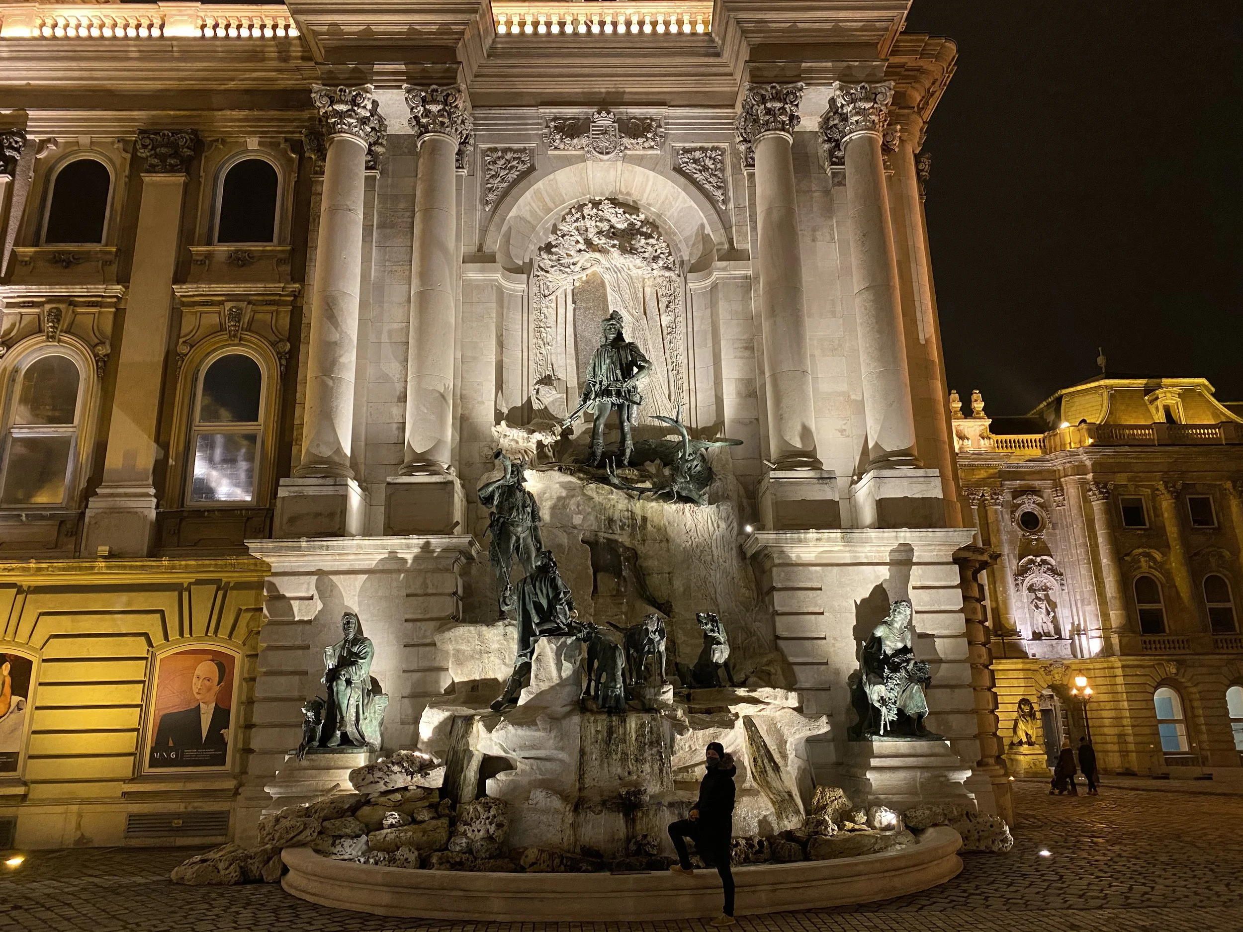 Beautifully lit up statue by night in the Castle District, in Budapest, Hungary