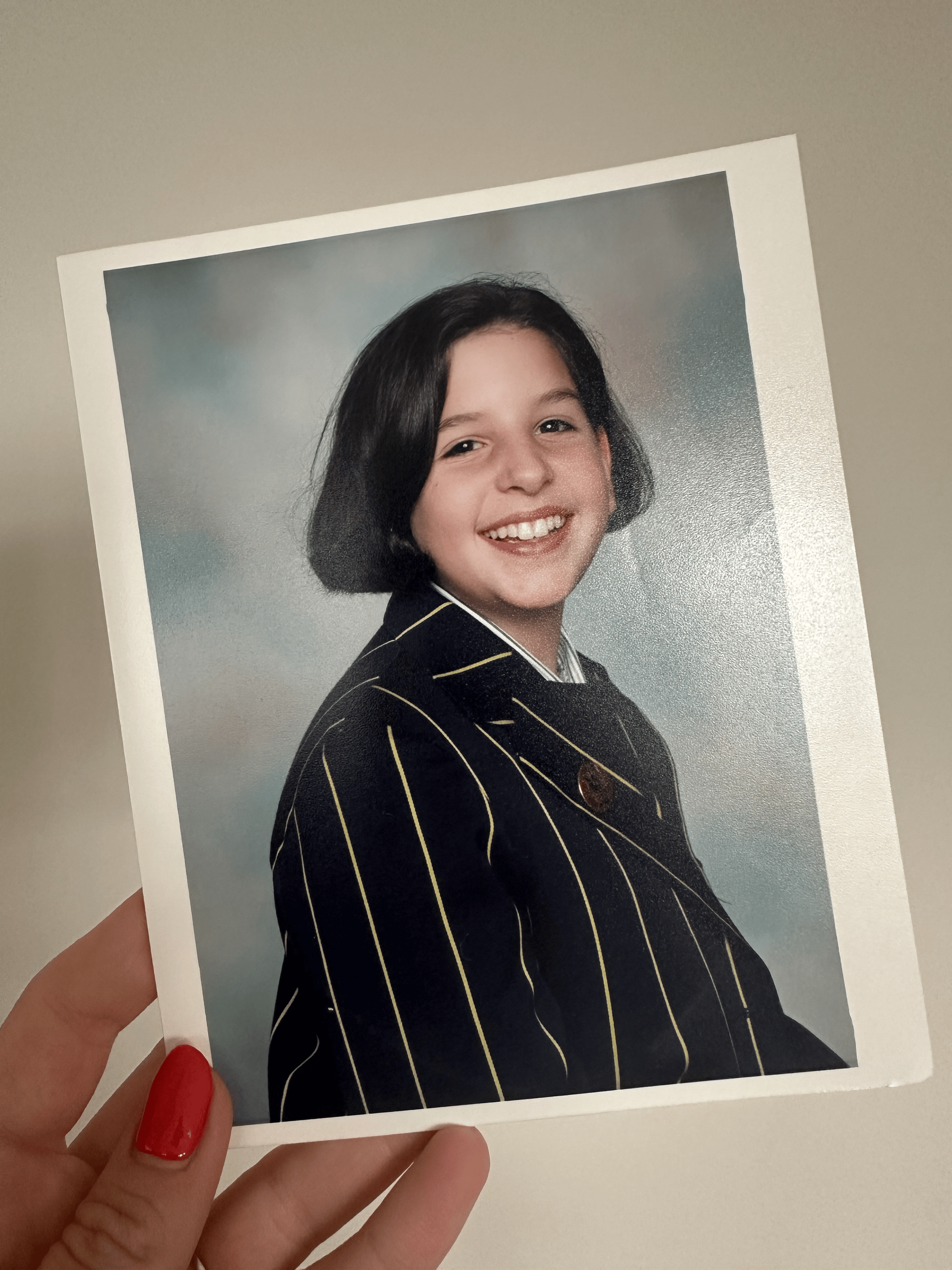 Natalie as an 11-year old girl in a professional school portrait photograph.