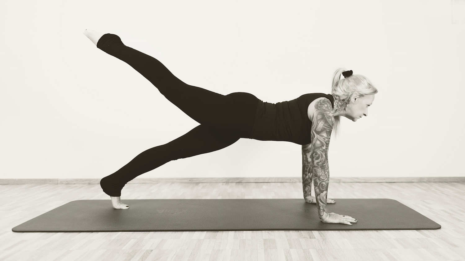 Nina Haldemann performs a high plank with leg pull front at the ND Pilates studio
