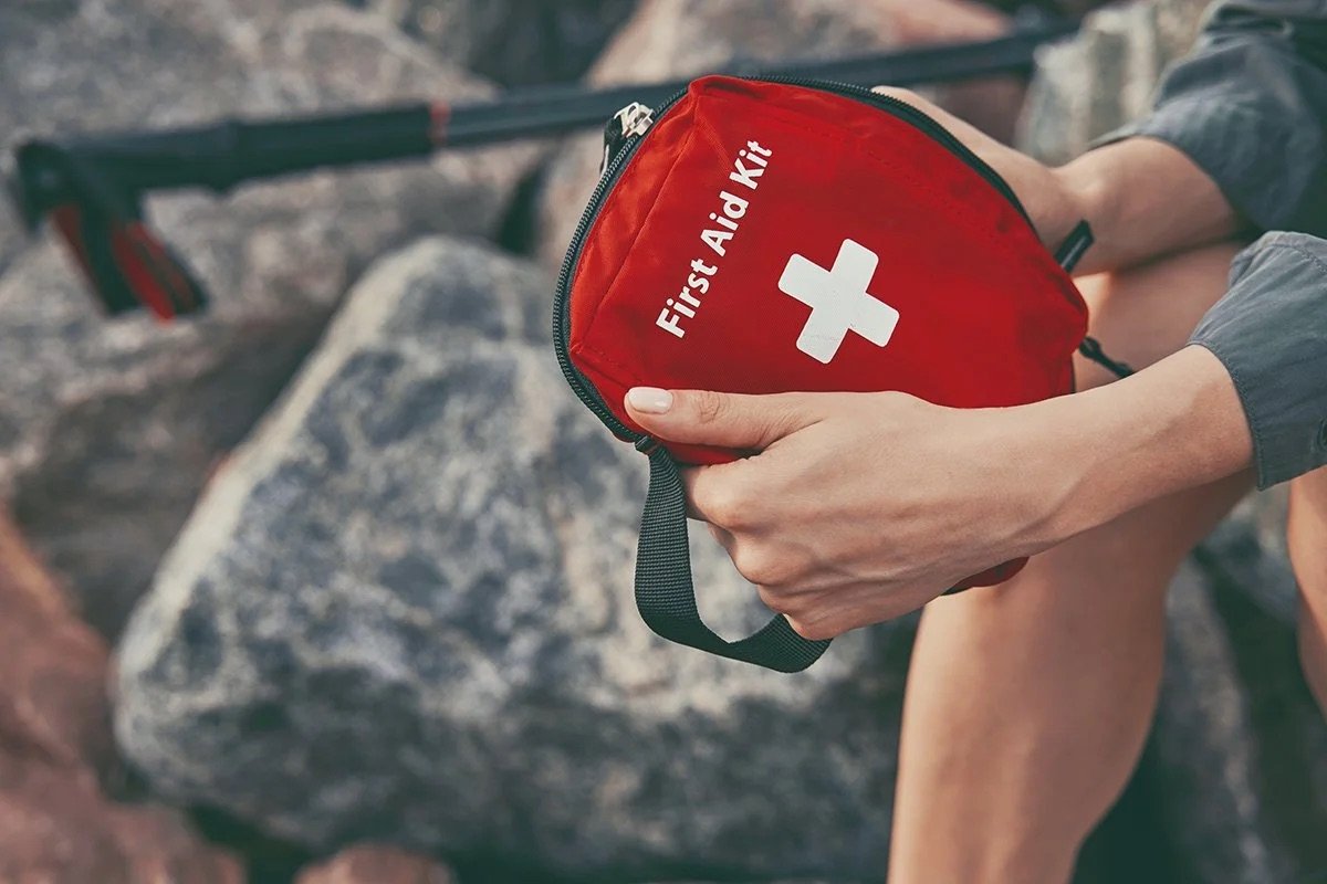 first-aid-kit-in-hands-of-a-tourist-2024-10-21-19-51-04-utc.jpeg
