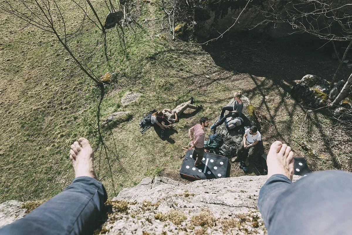 high-angle-perspective-of-boulderer-above-friends-2025-04-04-08-28-45-utc.jpeg