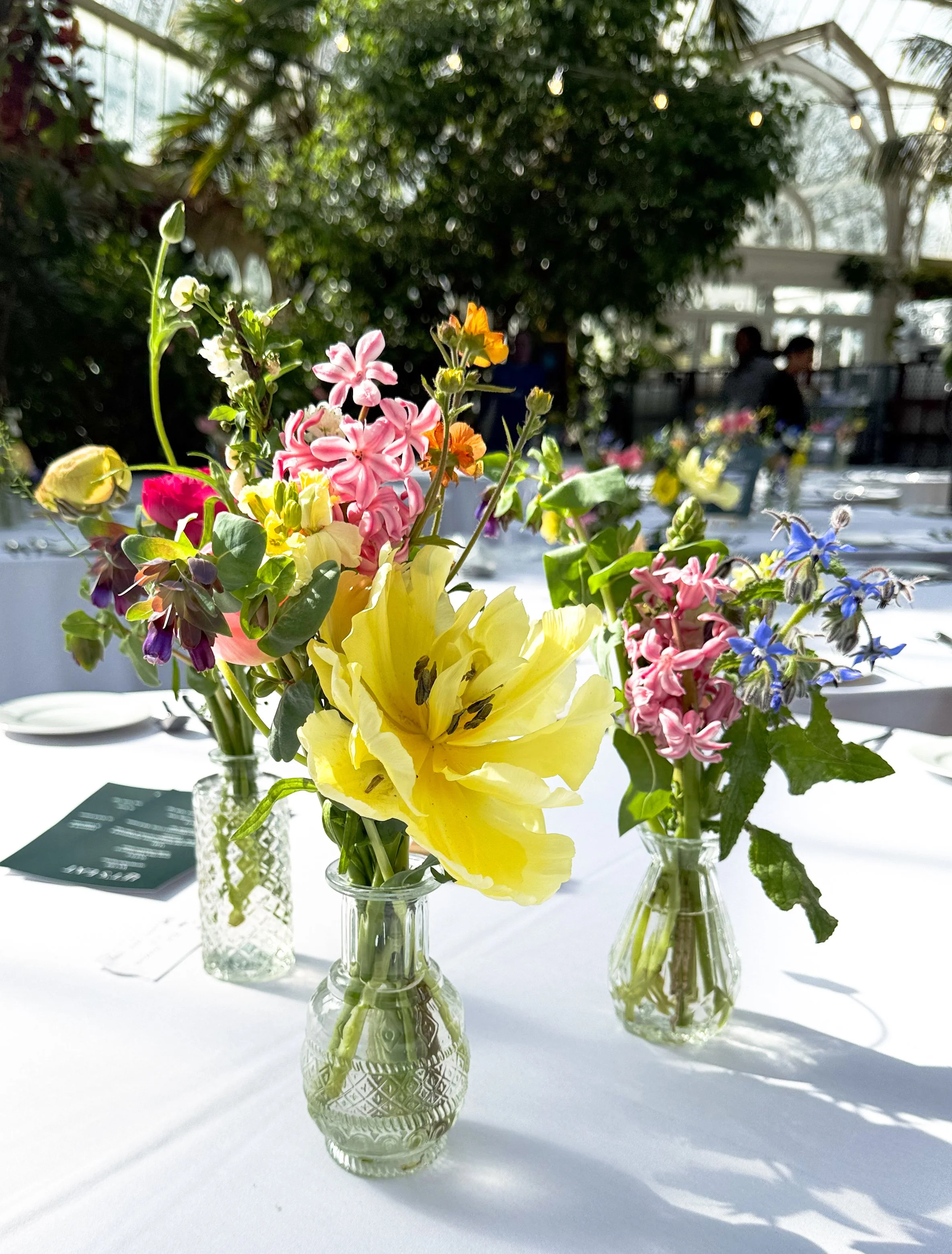 Bud Vase £12 each. The price is for a glass bud vase, filled full of flowers. Make great favours to give away to your guests at the end of the day.
