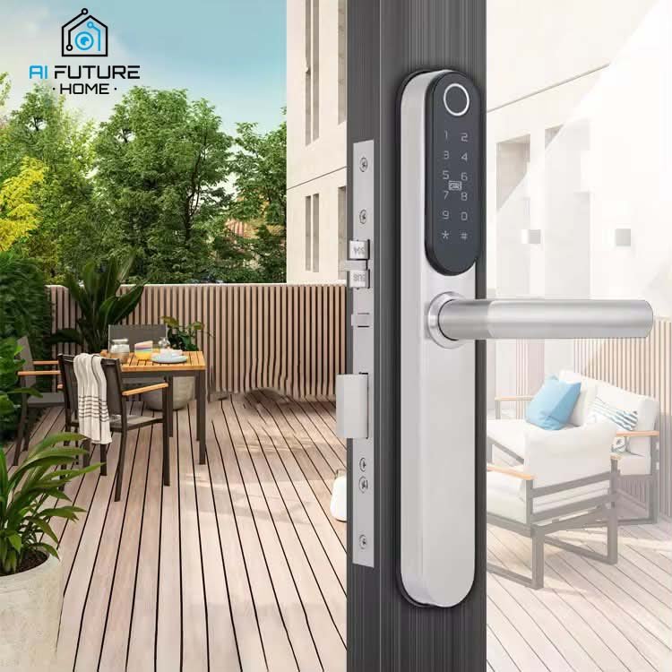 Close-up view of a smart electronic front door lock with keypad and handle, on a glass door leading to an outdoor patio with wooden furniture and trees.