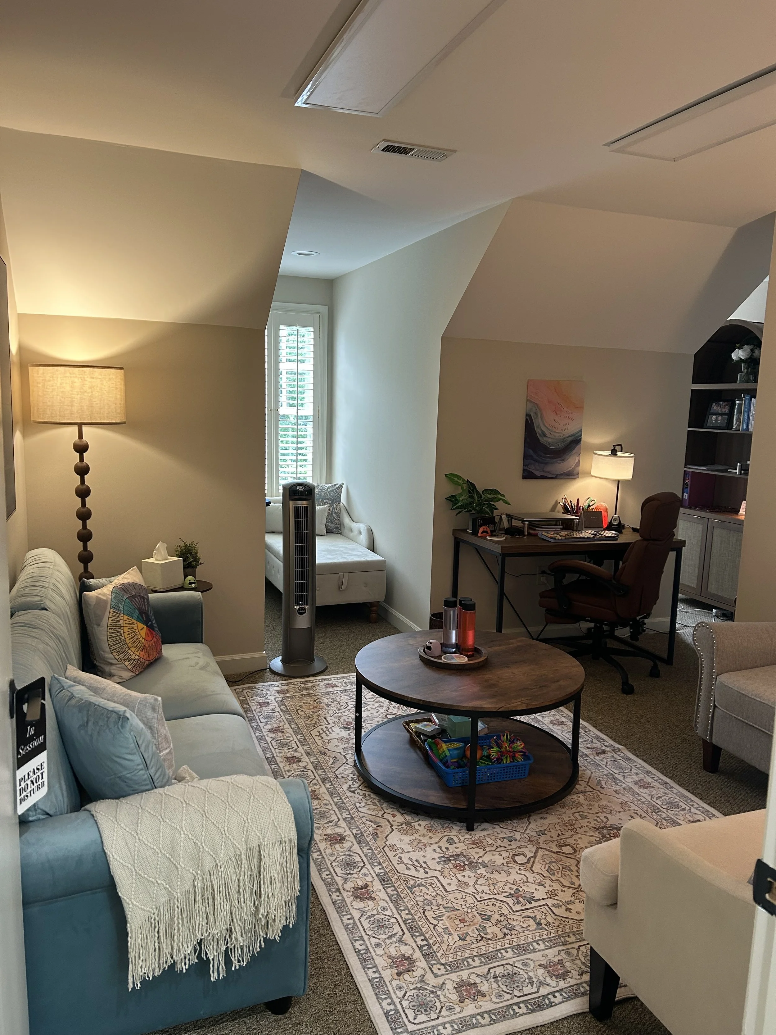 Welcoming counseling office with comfortable seating and natural light