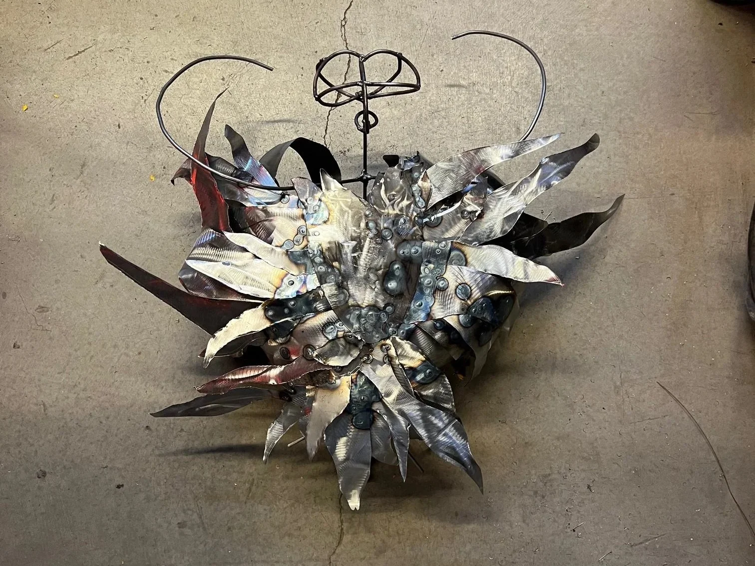 The armature for the head, wings and tail was added. Started the process of adding the flame feathers to fill out and shape the body.