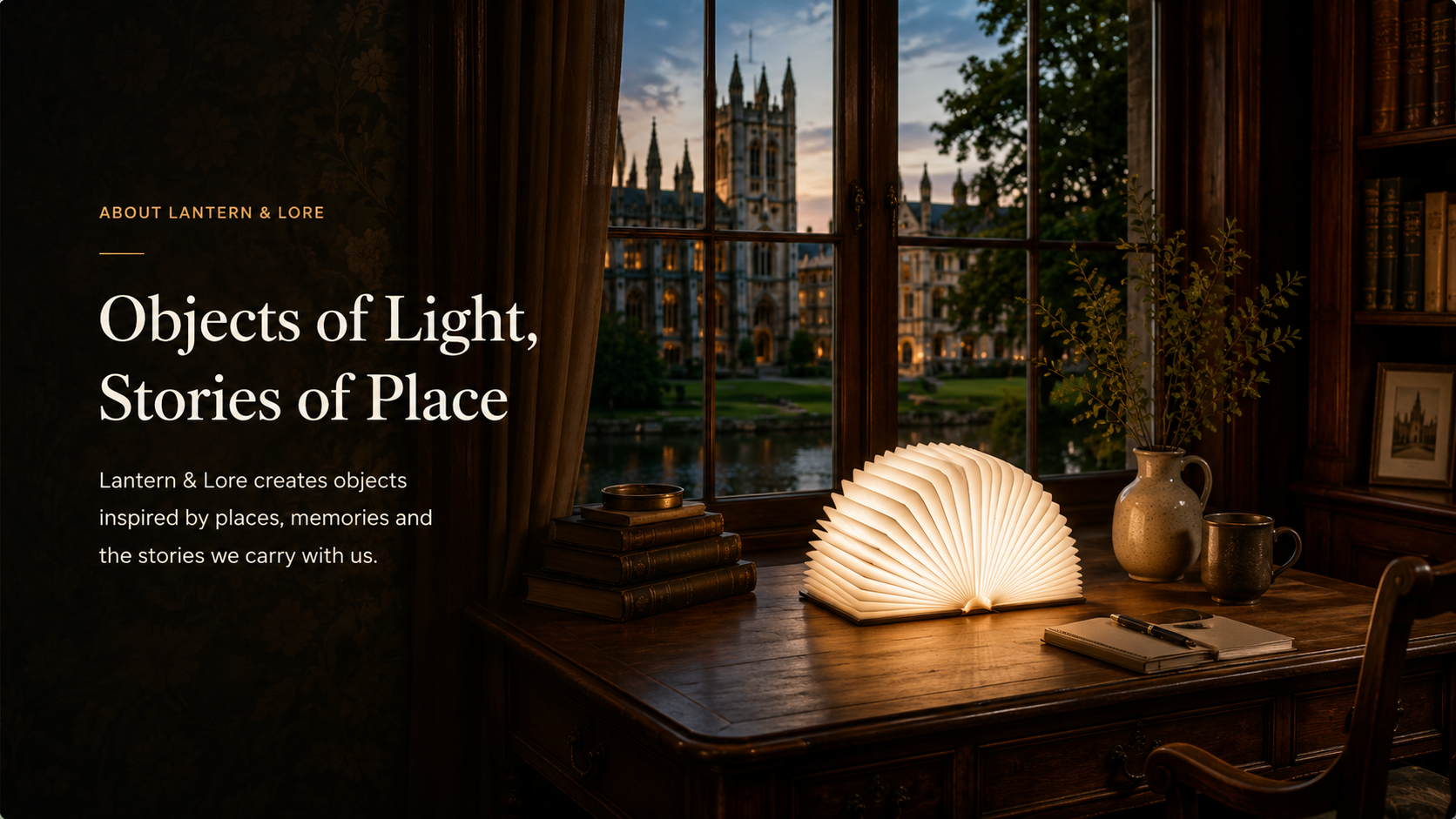 Lantern & Lore folding light glowing on a desk beside books, inspired by places, stories and heritage.