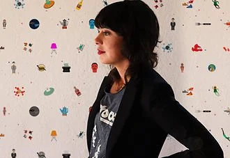 Photograph of Michelle Leclerc with background of small illustrations.