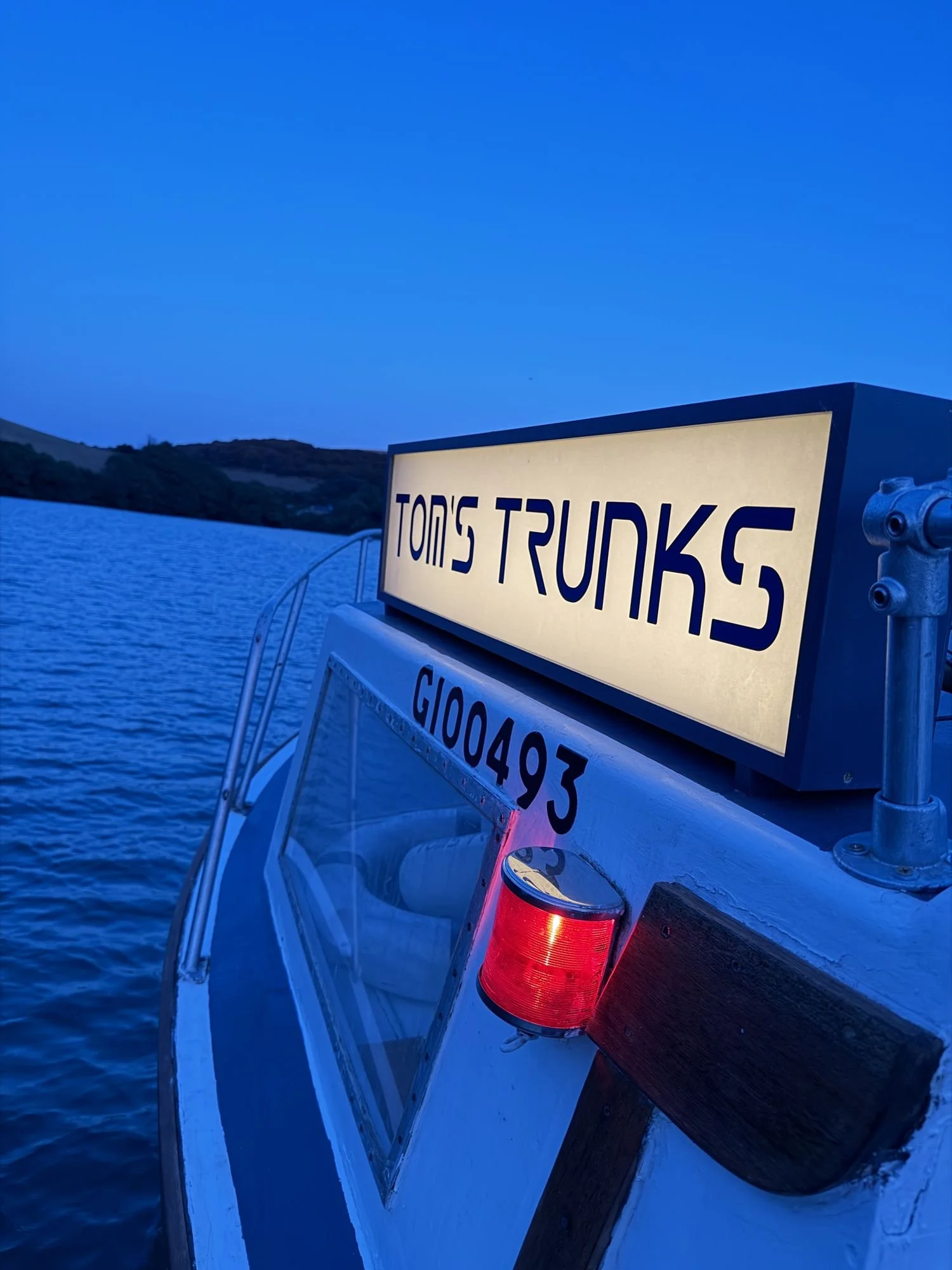 db-studios-toms-trunks-branded-boat-sign-detail.jpg