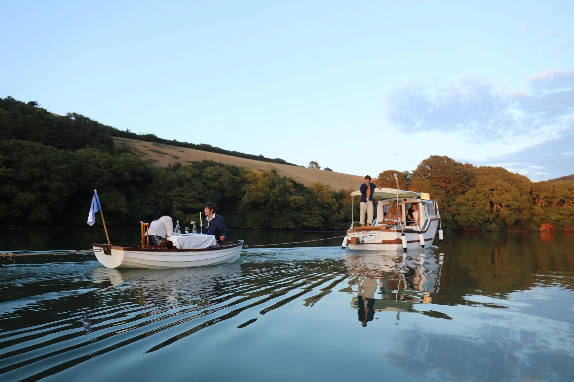 db-studios-toms-trunks-dining-boats-at-dusk.jpg
