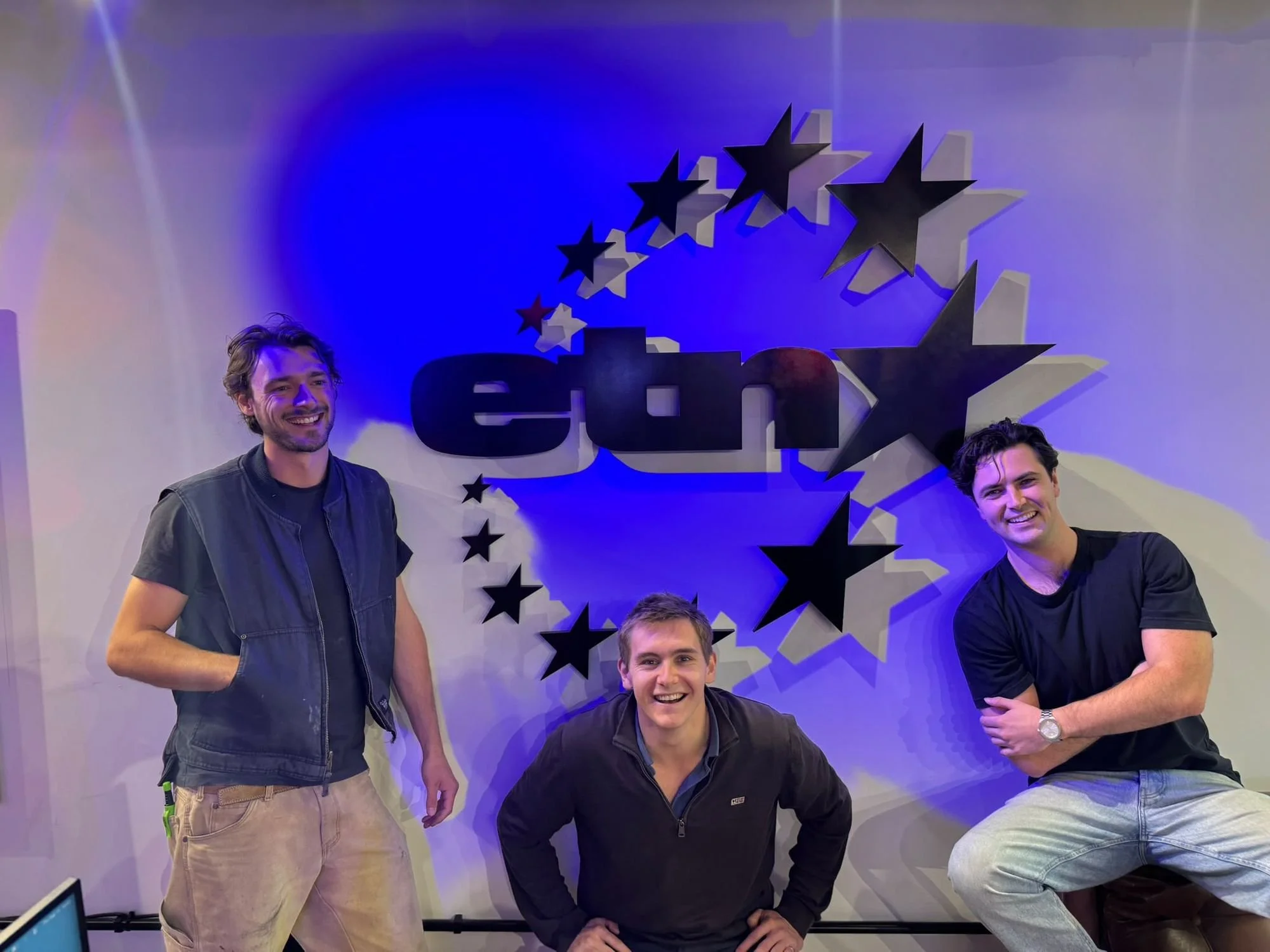db-studios-etn-team-in-front-of-the-finished-sign.jpg