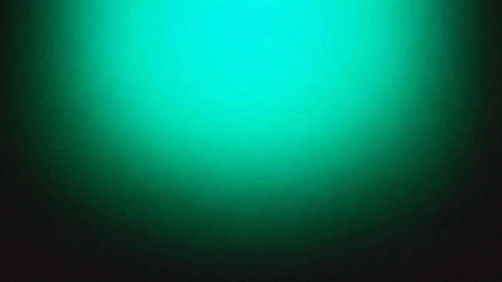A blurred, glowing green and turquoise gradient background.