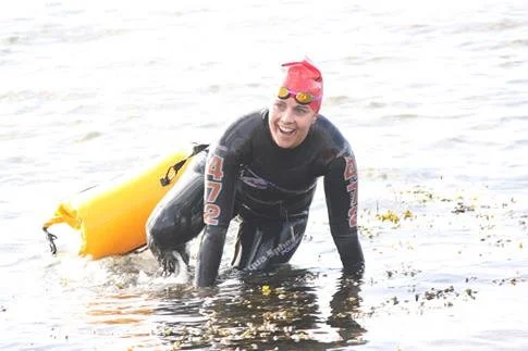 Open water introduction to swimming for children and adults