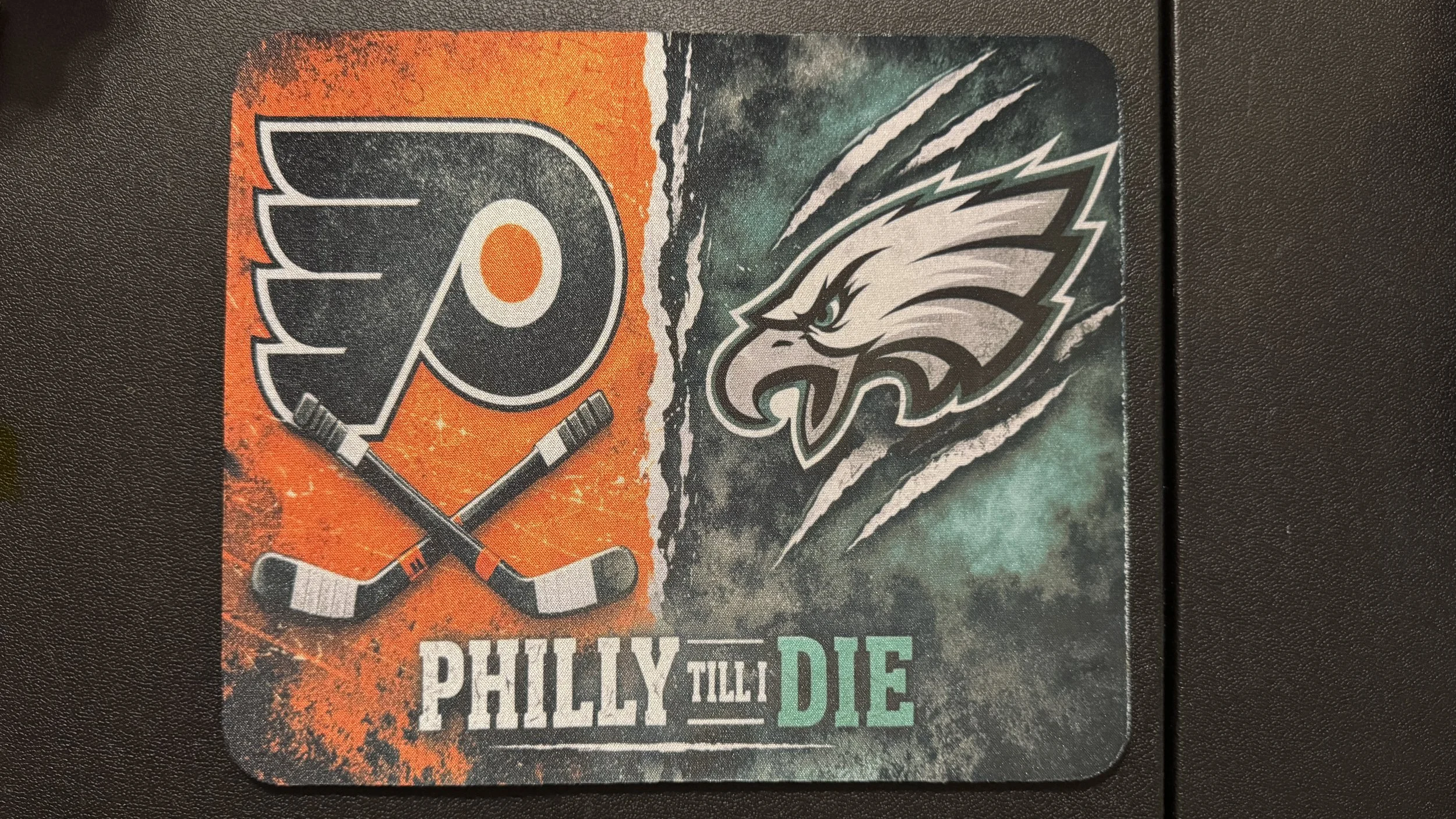 A sticker split into two halves: the left side features a hockey goalie mask with crossed hockey sticks on an orange background, and the right side displays an eagle's head with a fierce expression on a dark background with claw marks. The sticker ha