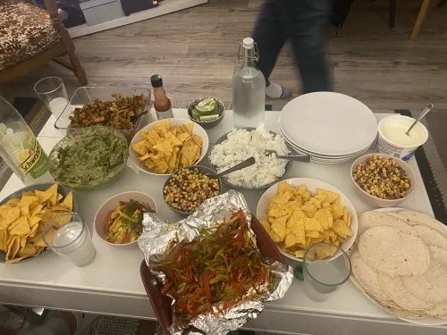Katie and I have hosted many dinners! I don't have photos of the people we have spent time with, but here is one of the many taco nights we have had!