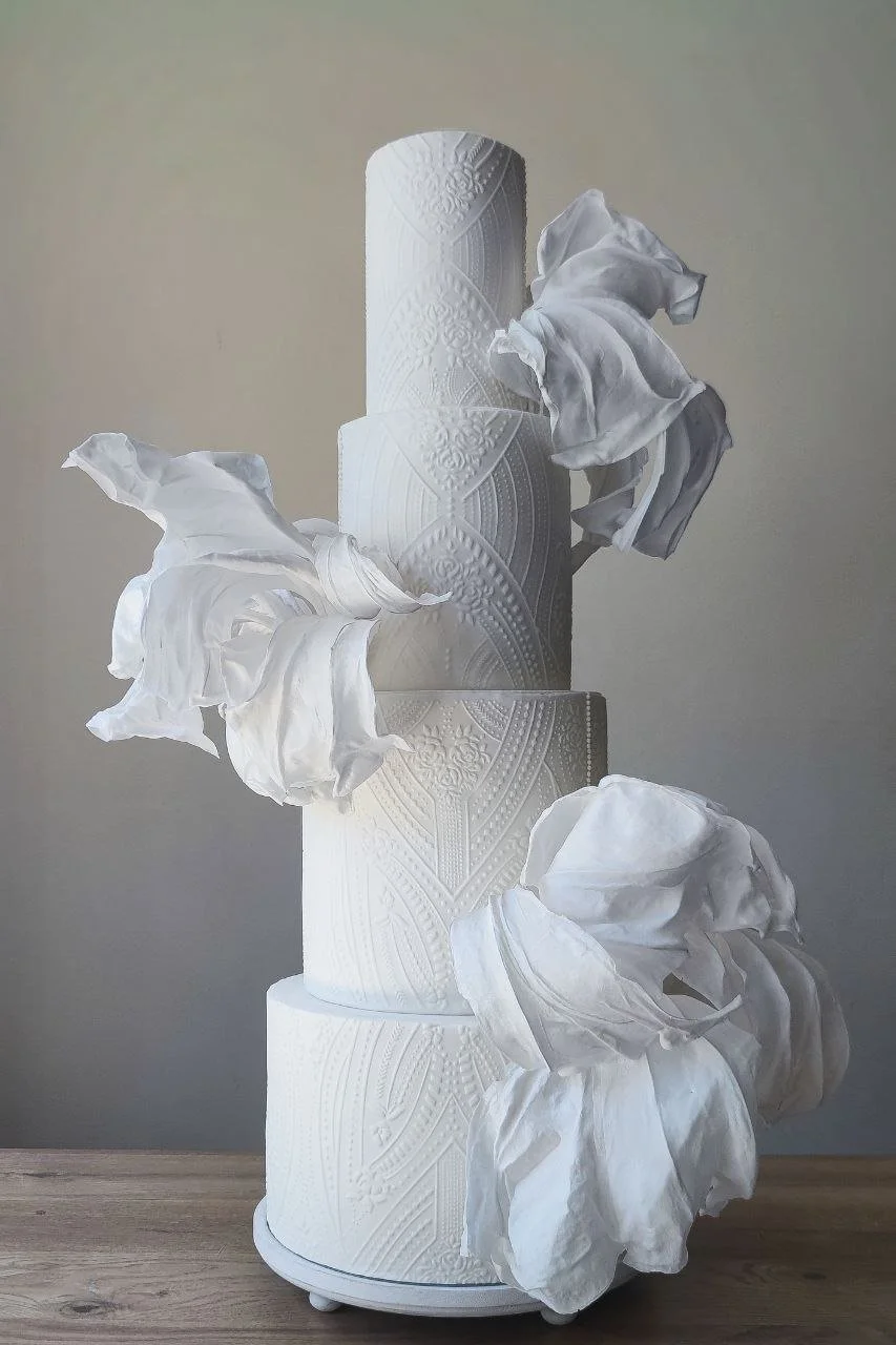 Modern luxury white wedding cake with contemporary textured design - details