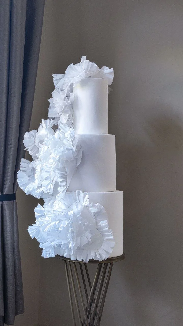 Modern luxury white wedding cake with contemporary design - full view