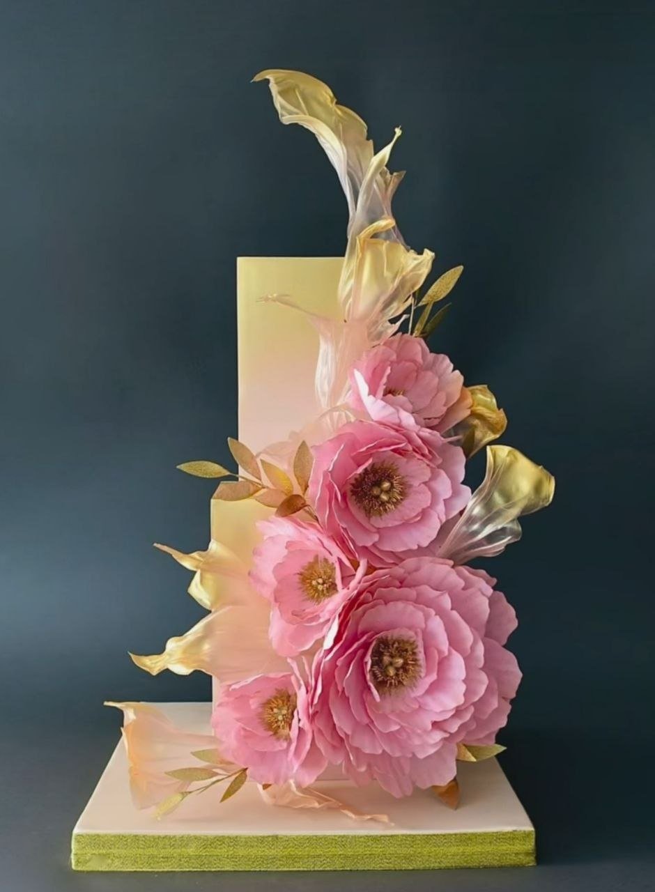 A beautiful celebration cake with wafer paper flowers