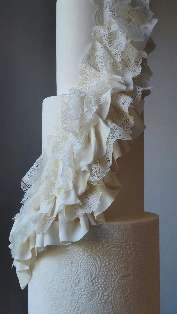 modern wedding cake with lace disign - detail