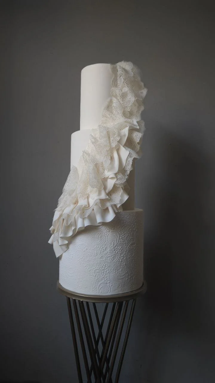 modern luxury ivory wedding cake with lace - full view