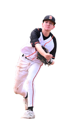 Young male baseball player in uniform preparing to catch a ball, dressed in white pants, a black and red jersey, and a cap.