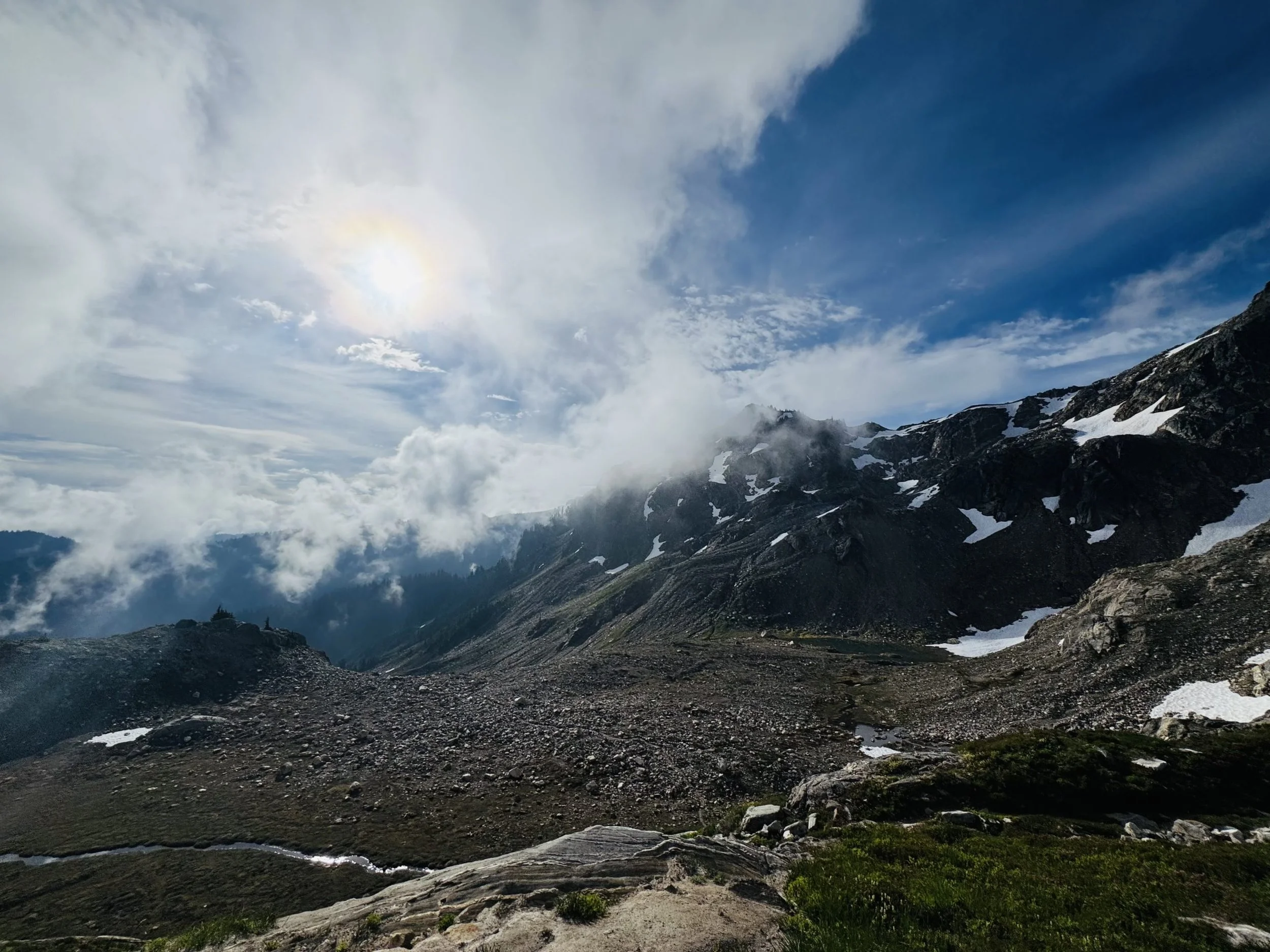 Snow Dusted Mountains and Clouds