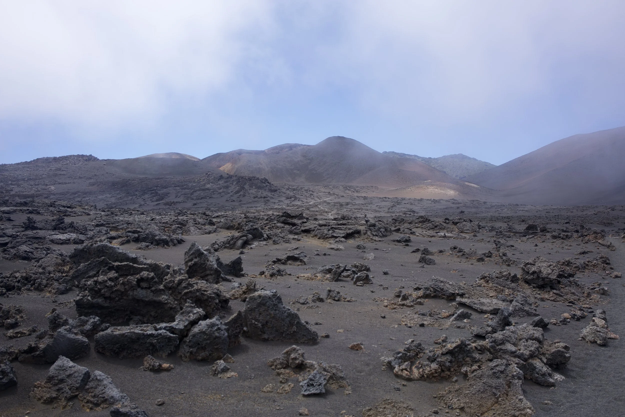 Volcanic Rock and Clouds