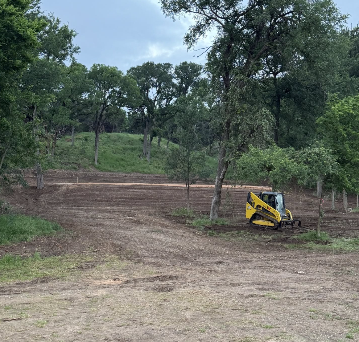 After clearing and grading hill and intsalling pad for shop.
