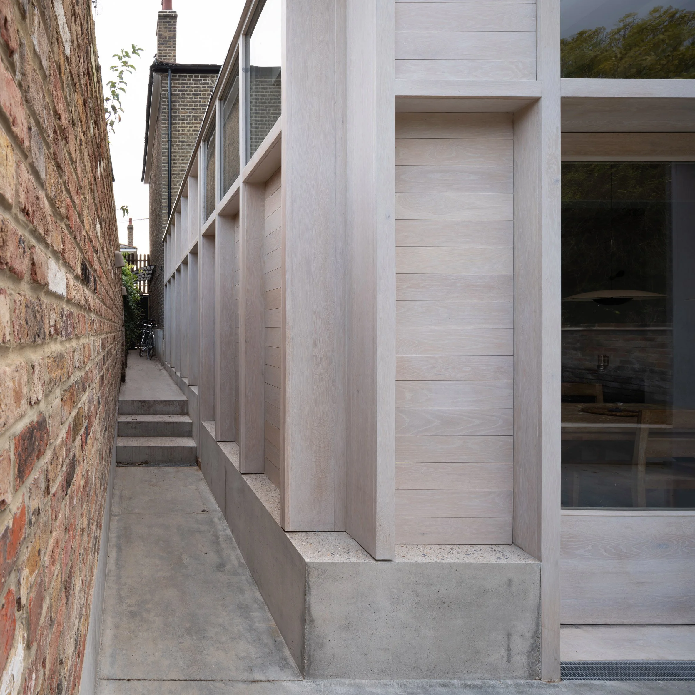 dgn-studio-concrete-plinth-house-brutalist-extension-london_dezeen_2364_col_21.jpg