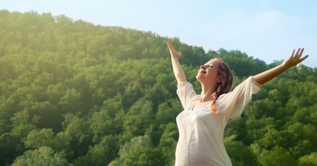 Woman experiencing emotional freedom and nervous system balance through Neuro Emotional Technique