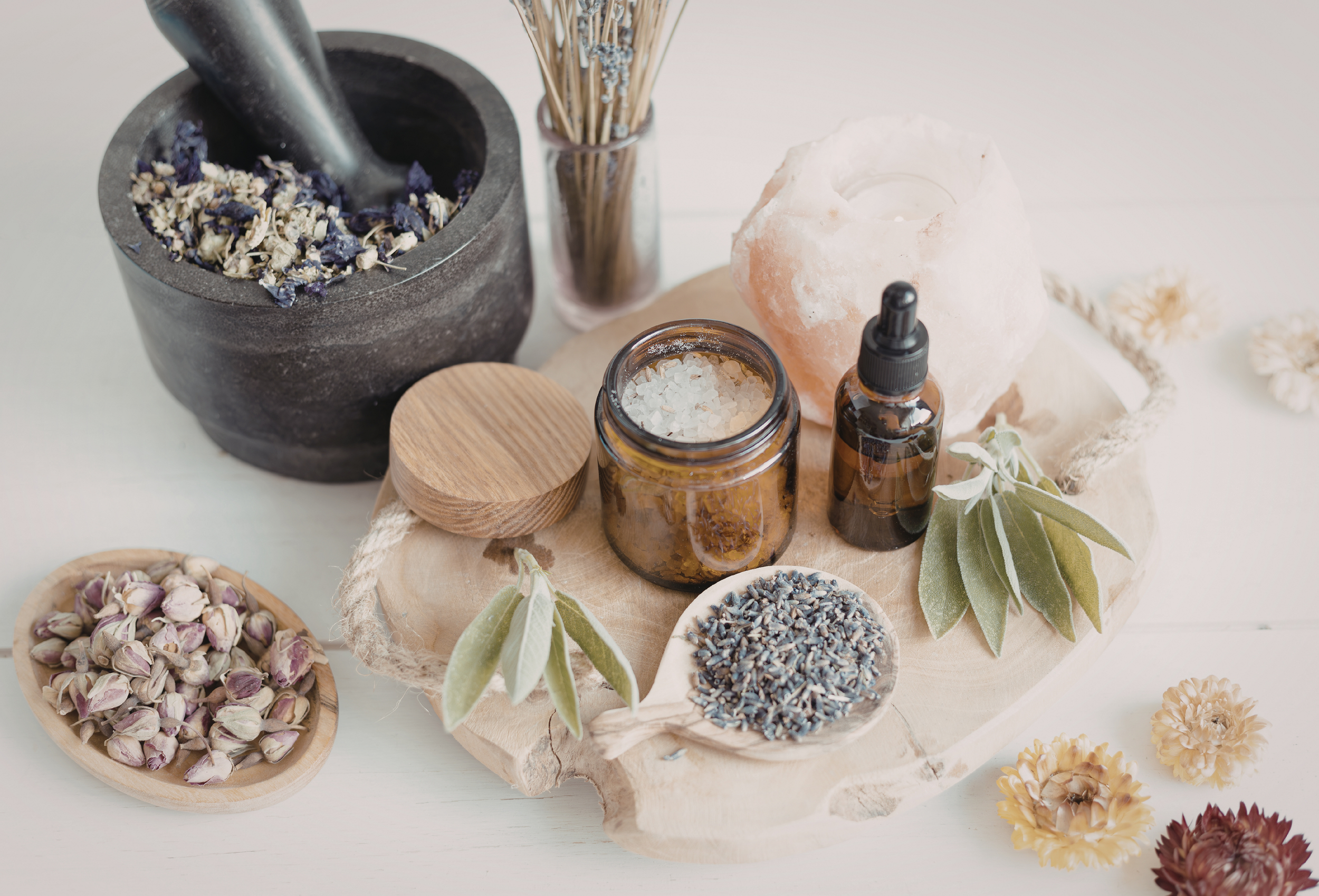 Natural herbal remedies, essential oils, and dried botanicals for holistic stress relief and wellness