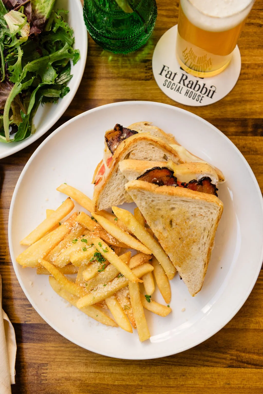  Hot lunch sandwich with fries and beer 