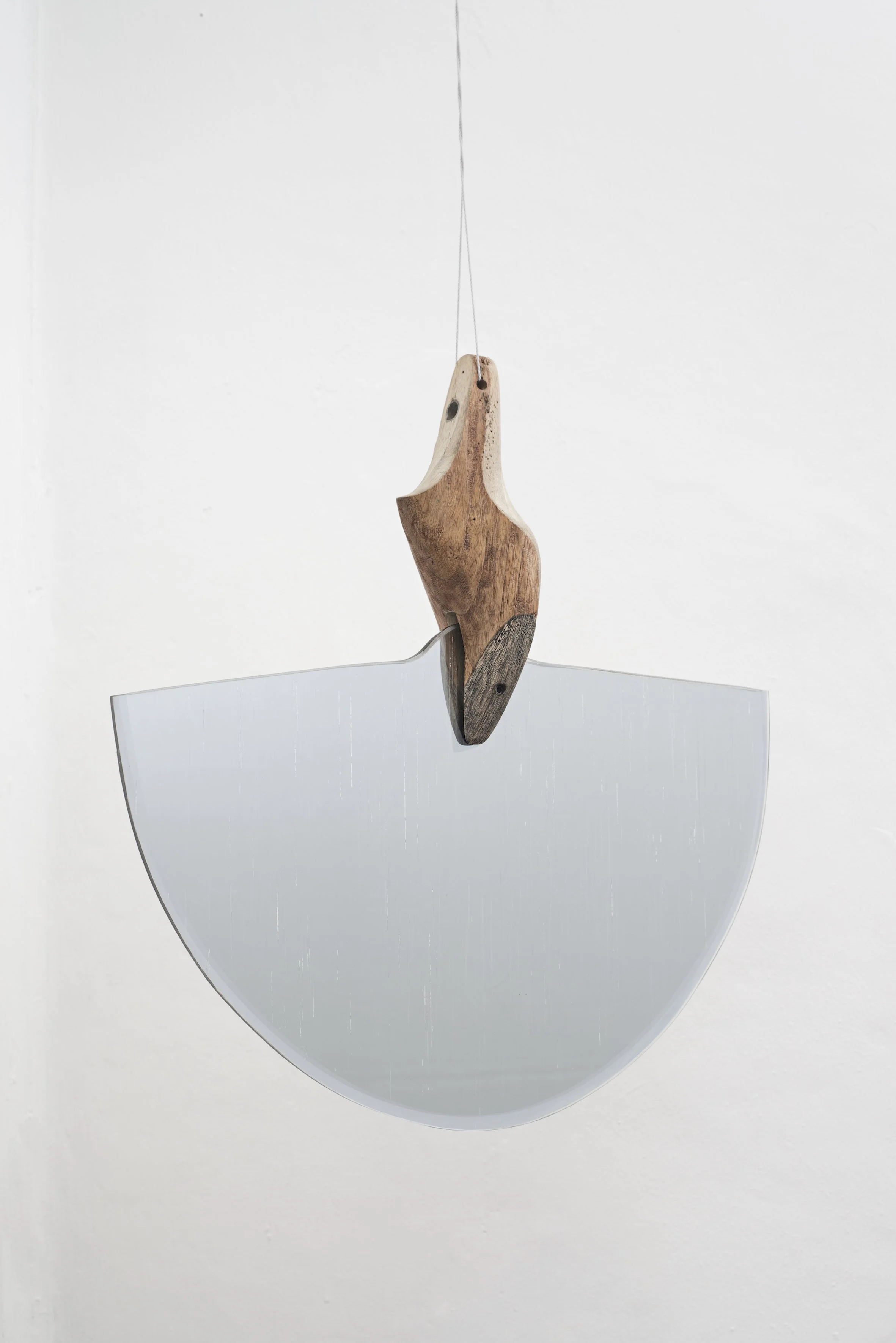 1ST MOVEMENT, 2015 (Pendular Series) by artist Omar Barquet
50 x 50 x 10 cm / 20 x 20 x 4 in
Manually altered mirror fragment, shoe mold carved and enameled, gold pin and string.