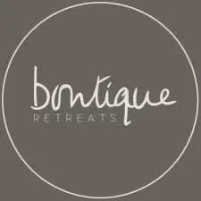 Logo for Boutique Retreats with the words 'boutique' and 'RETREATS' inside a circle