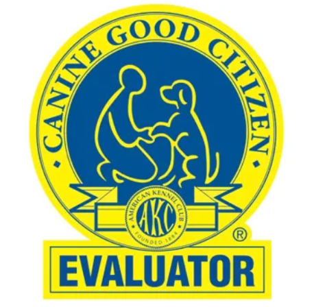 Logo of Canine Good Citizen evaluator with a blue and yellow color scheme, featuring a silhouette of a person and a dog shaking hands, and the text "Canine Good Citizen Evaluator."