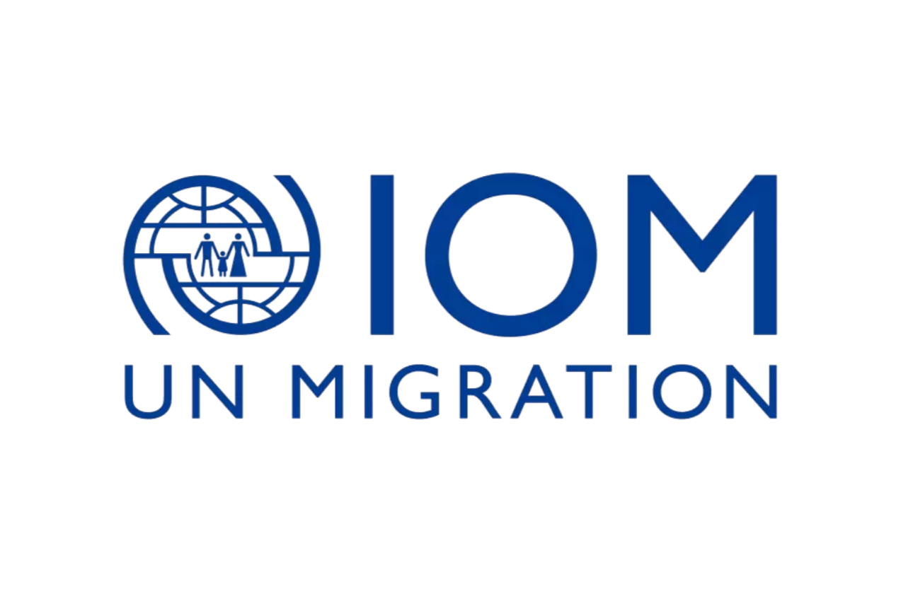 Logo for IOM Unmigration featuring a globe with two figures inside and blue text.