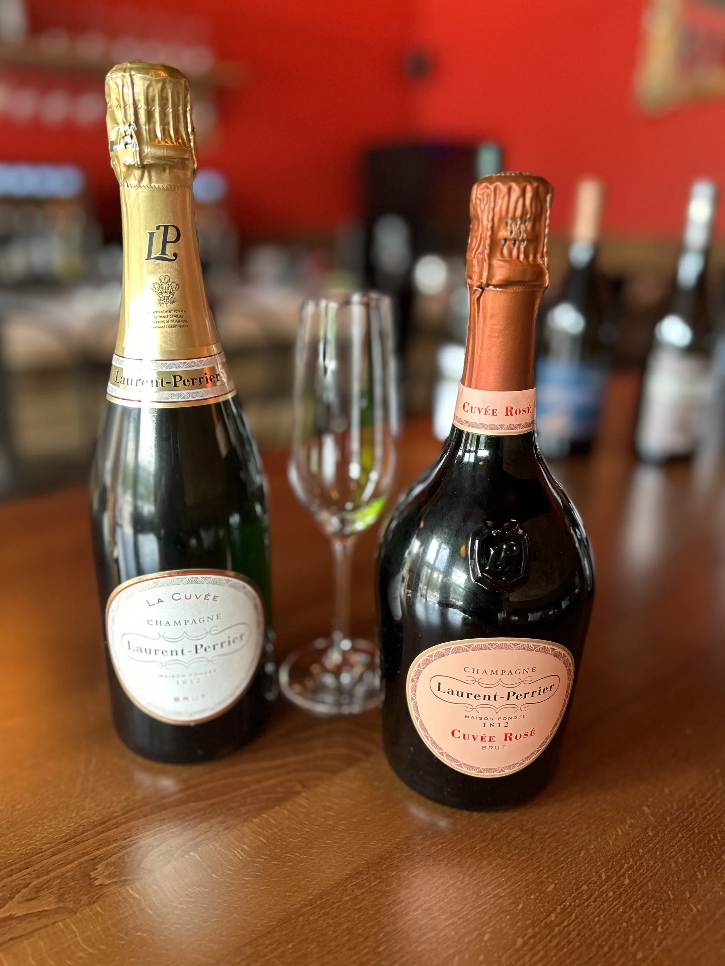 Laurent-Perrier Brut and Rosé Champagne served at TINTO Wine Bar, just minutes from Red Rocks Amphitheatre.