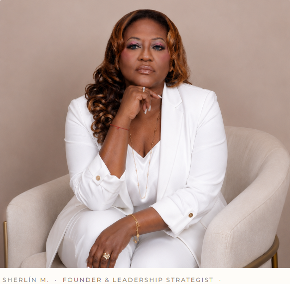 Sherlín M., founder of Sherlín M., seated in a leadership portrait