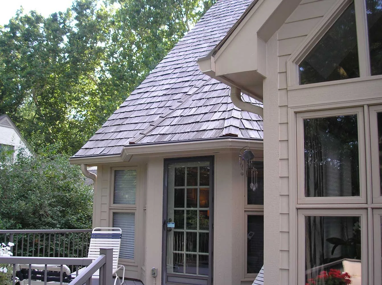 Leaf Sentry panels on a taupe colored house