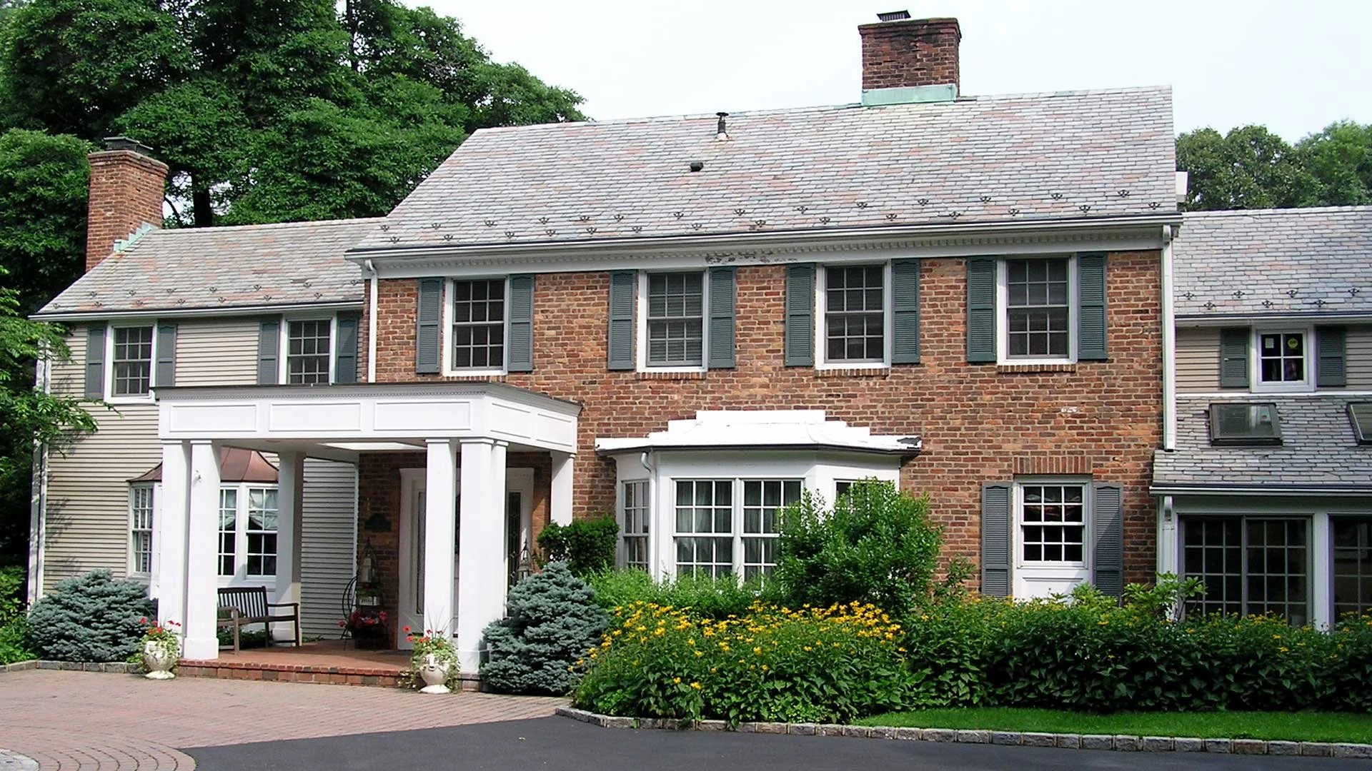 Red brick home with Leaf Sentry gutter protection