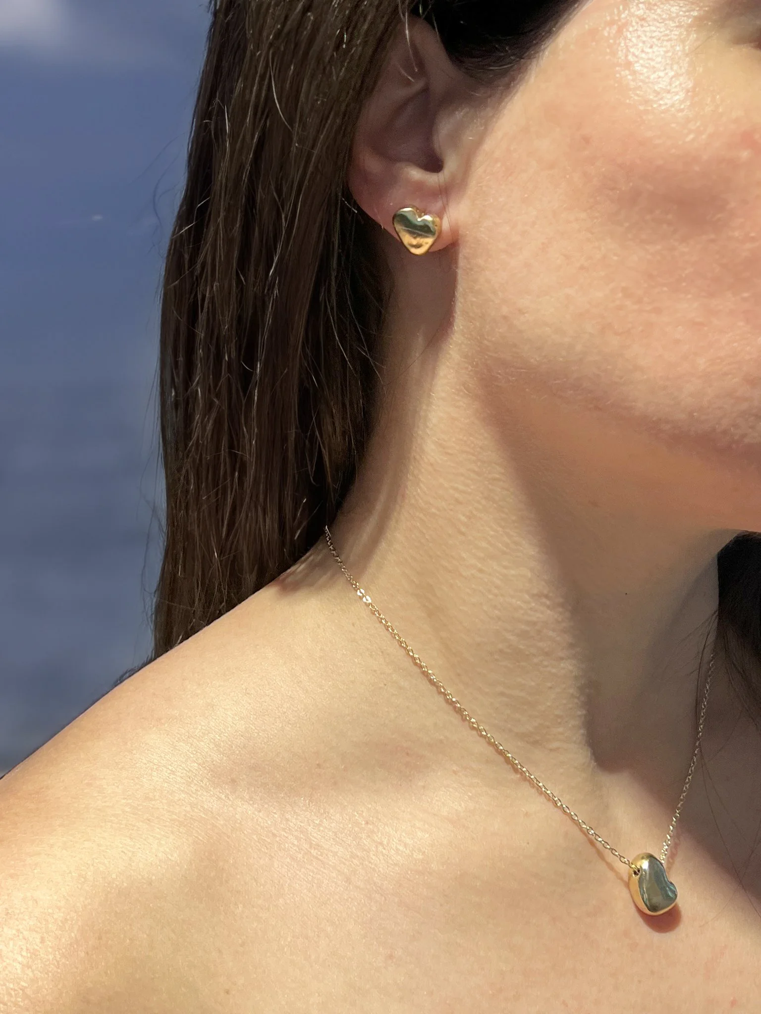 sculpted-hearts-gold-earrings-necklace.jpg