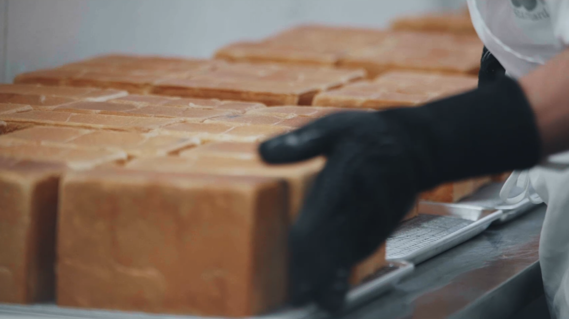 Fresh SHOKUPAN loaves during production at (mu) Standard